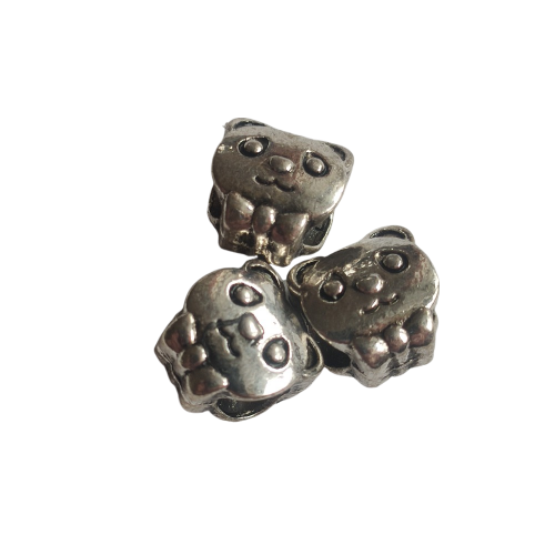 Kovový korálek cca 10x8mm, dírka cca 4mm - medvídek